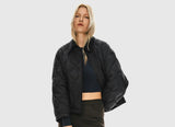 Cómo Dominar el Arte del Layering con una Chaqueta Acolchada en NYC